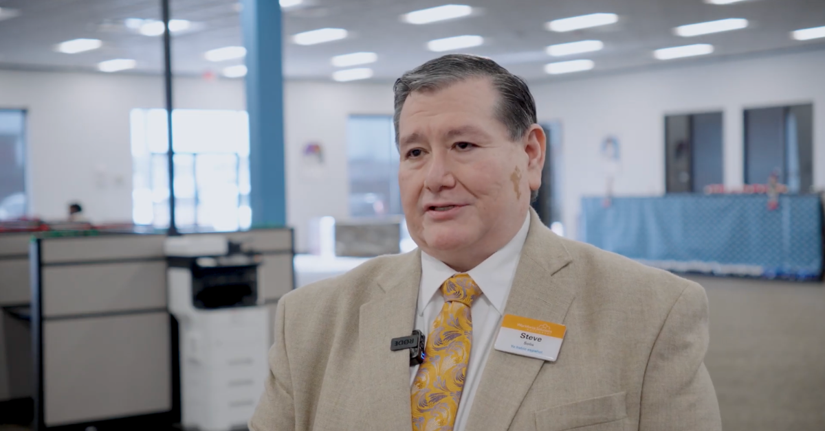 Steve Solis, Business Consultant with Workforce Solution, speaks in a well-lit office.