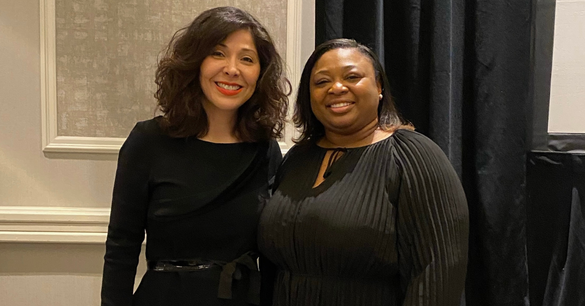 Juliet Stipeche, Executive Director of the Gulf Coast Workforce Board and Workforce Solutions Gulf Coast, standing next to LaToya Casimere, manager of Youth Services.