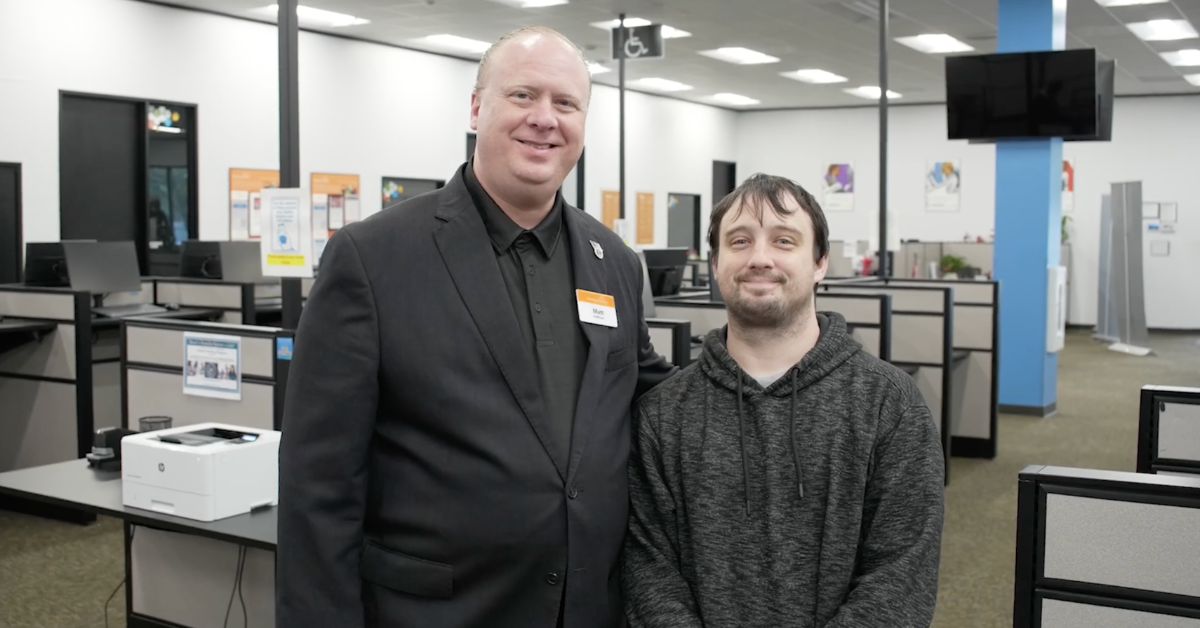 Matt Hoffman, career adviser at the Conroe Workforce Solutions office is standing next to Glenn Spitz, a job seeker.