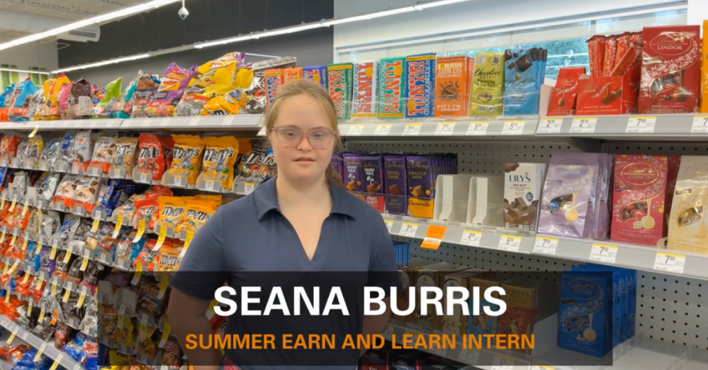 Summer Earn and Learn intern Seana Burris stands in a retail health aisle during his workplace experience with Workforce Solutions Gulf Coast.