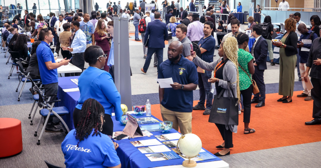 Job seekers speak with employers and explore career opportunities at a Workforce Solutions Gulf Coast hiring event.